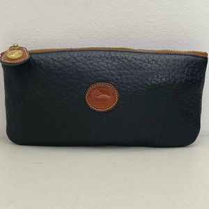 Woman’s Dooney and Bourke handbag